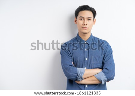 Similar – Image, Stock Photo Photo of good looking African American prosperous busineswoman waits for partner in office, drinks coffee discusses future plans with colleague looks away with cheerful expression wears formal clothes