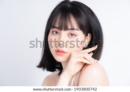 Attractive young Asian woman with fresh skin. Face care, facial treatment, , woman beauty skin isolated on white background. cosmetology, beauty skin and cosmetic concept