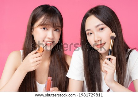 Image, Stock Photo Two beautiful sisters do their homework during quarantine. Children use gadgets for learning. Education, distance learning, home schooling during quarantine