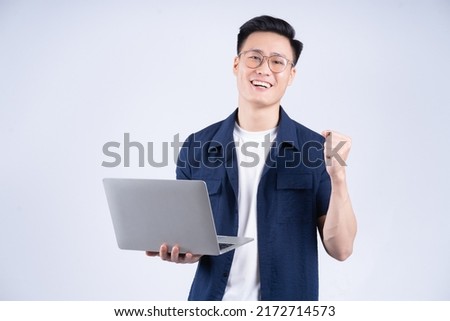 Similar – Image, Stock Photo Asian man in eyeglasses on street