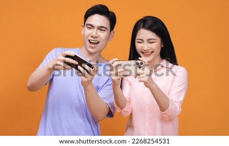 Similar – Image, Stock Photo Young couple playing with their soon at home.