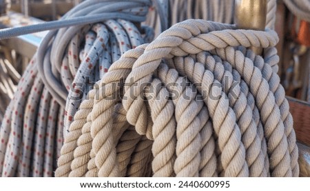 Similar – Image, Stock Photo Coil of used mooring ropes.