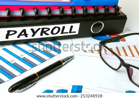payroll concept on business folder