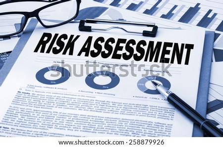risk assessment analysis concept on clipboard