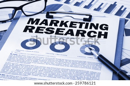 marketing research concept on clipboard