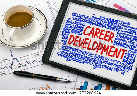 career development concept with related word cloud hand drawing on tablet pc