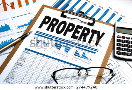 property concept on business clipboard