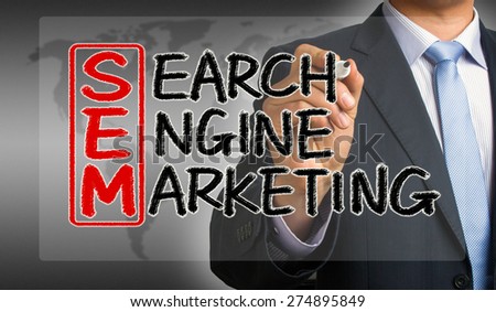 SEM concept:search engine marketing handwritten by businessman