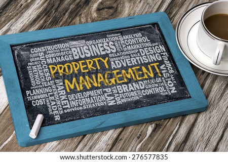 property management concept with related word cloud handwritten on blackboard