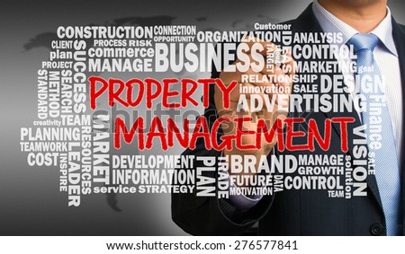 property management concept with related word cloud handwritten by businessman