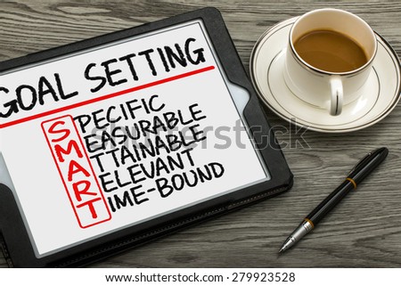 smart goal setting concept hand drawn on tablet pc