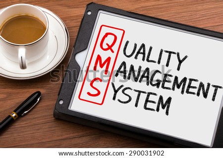 qms concept:quality management system on tablet pc