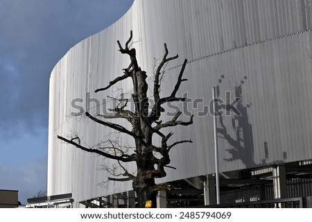 Similar – Image, Stock Photo Glass wavy facade of an office building