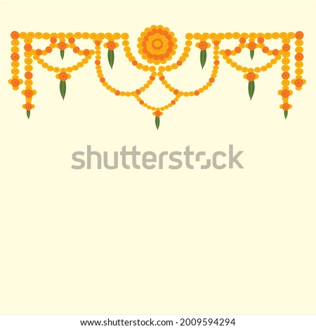 Welcome floral decoration hanging marigold flowers in yellow and orange color with mango leaves off white color background.