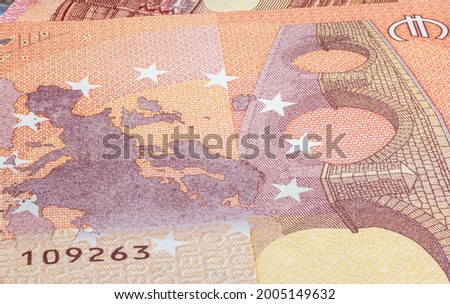 Macro close up on the design surface of 10 euro notes. Banknotes of the European Union. Wallpaper background of money. Detailed currency closeup. Euros isolated flat capture, New Ten Euro Note Stockfoto © 