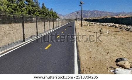 Similar – Image, Stock Photo Tree-lined path off Street