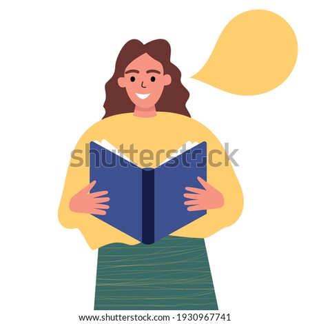 Girl holding a paper book in her hands, reading aloud. A girl reads a book