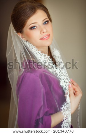 Beautiful bride wedding makeup and hairstyle. portrait of young bride at wedding day. series. soft tonality