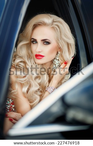 Beauty sexy woman portrait luxury life, Fashionable vogue girl with car bright makeup long blond hair. beautiful blonde lady at sunset. Beautiful fashionable young woman. series
