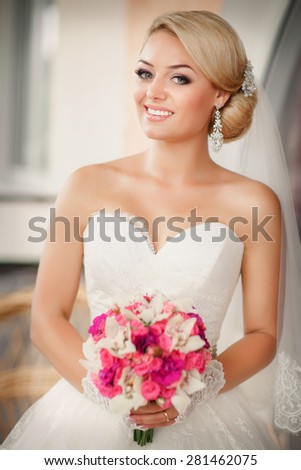 Beautiful Bride Portrait wedding makeup, wedding hairstyle, Wedding dress. Wedding decoration. soft selective focus. gorgeous young bride at home
