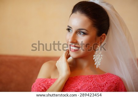 Beautiful Bride Portrait wedding makeup, wedding hairstyle, Wedding dress. Wedding decoration. soft selective focus. gorgeous young bride at home. series.