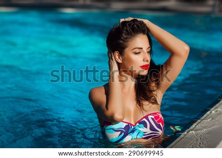 Beautiful woman in swimming pool summer vacation, sexy girl bikini fashion  summertime, tanned female model, luxury lifestyle, series