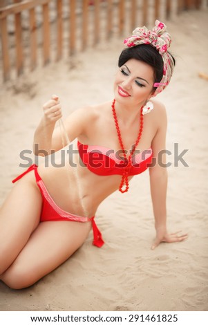 Beautiful woman at beach summer vacation,pinup style sexy girl outdoor portrait, tanned bikini model, pin up young woman at sand beach at Miami, sensual latin woman outdoor, soft retro tonality series