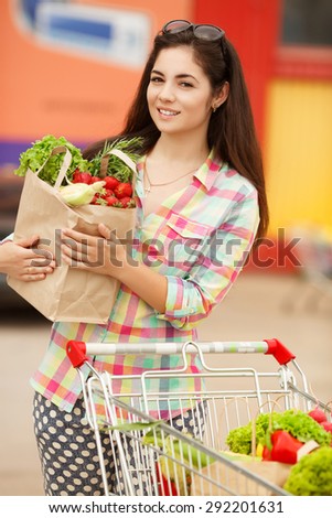 Happy woman in market, girl with vegetables at grocery shop, shopping young female with purchase, smiling woman with organic food at supermarket, instagam style filters, series
