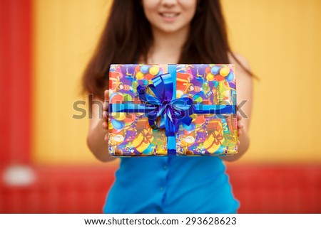 Shopping young woman with gift boxes at supermarket, happy girl with birthday present at shopping mall at sales, smiling female at birthday party with gifts, instagram style color filter,series
