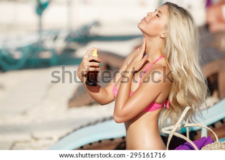 Happy woman bikini at beach, tan girl with suntan lotion, tanned sexy girl in swimsuit at pool, sensual blonde female summer vacation summertime, glamour lady in swimwear with suntan lotion, series
