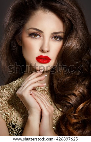 https://image.shutterstock.com/display_pic_with_logo/2457938/426897625/stock-photo-bright-makeup-woman-red-lips-fashion-model-with-long-brunette-hair-sexy-girl-vogue-style-arabian-426897625.jpg