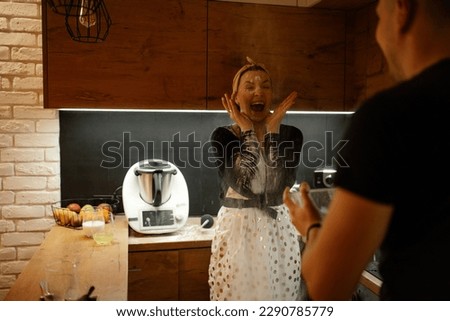 Similar – Image, Stock Photo Woman having fun throwing sand in desert