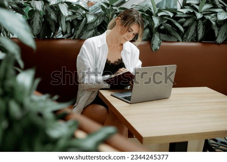 Similar – Image, Stock Photo Focused woman with map sitting near camping tent in nature