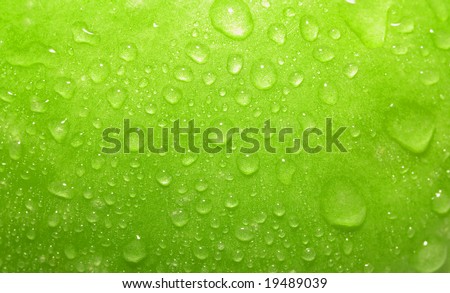Closeup green apple with water-drops