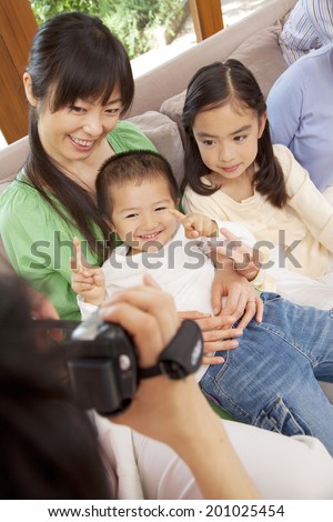 Father taking a video his family