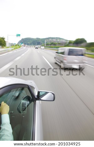 The cars running on the highway