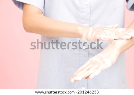 The hand of the woman washing their hands