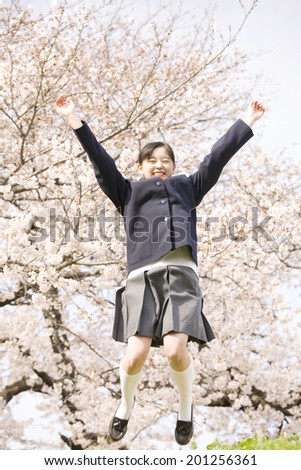 A jumping middle school girl