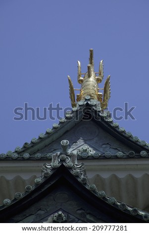 Killer whale pike and gold castle tower of Nagoya Castle