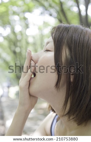 An Image of A Yawning Woman