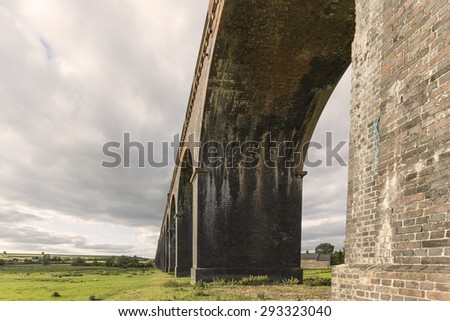 Under one of the 82 arches of Harringworth viaduct,showing the size and scale of this wonderful structure. Harringworth Northamptonshire, England.