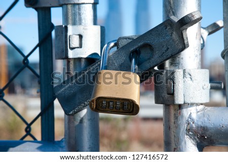 Close up on a gate and a lock
