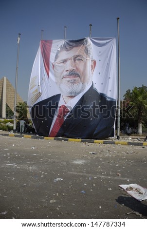 CAIRO - JULY 27: Big picture of the ousted president Mohamed Morsi in Rabaa el-adawya where security forces and thugs attacked Morsi supporters. July 27, 2013. Cairo, Egypt