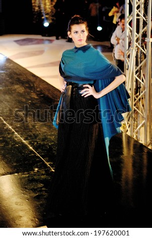 CAIRO - April 25: Model at Cairo Fashion Festival fashion show for the fashion designer Dina El Kei in Cairo, Egypt, April 25, 2014.v