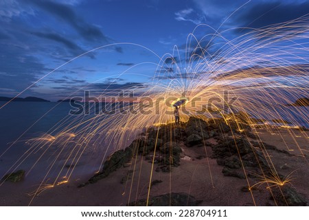 Amazing And Light steel wool .Fire dancing on the rocks in the Twilight pretty light.
