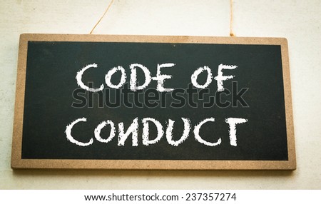 Text code of conduct concept on board