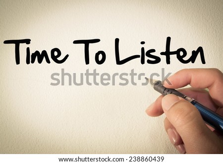 Time to listen text write on wall