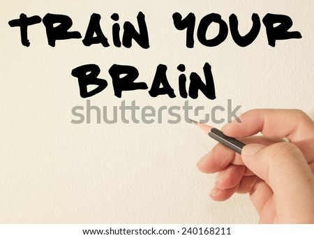 train your brain text write on wall