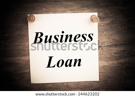 business loan text concept on note paper