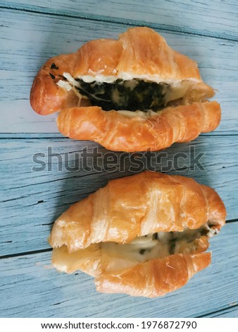 Spinach​ cheese​ croissant​ are​ common​ly​ eaten​ for​ breakfast​ with​ coffee​ or​ tea​ the​ main​ ingredient​s​ are​ bread​ flour​, milk, sugar, yeast, salt, water, butter​ Stock fotó © 